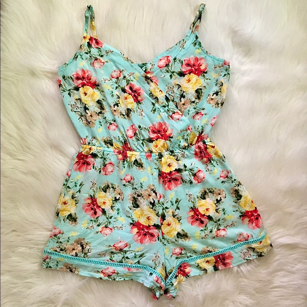Sky blue floral romper size Small